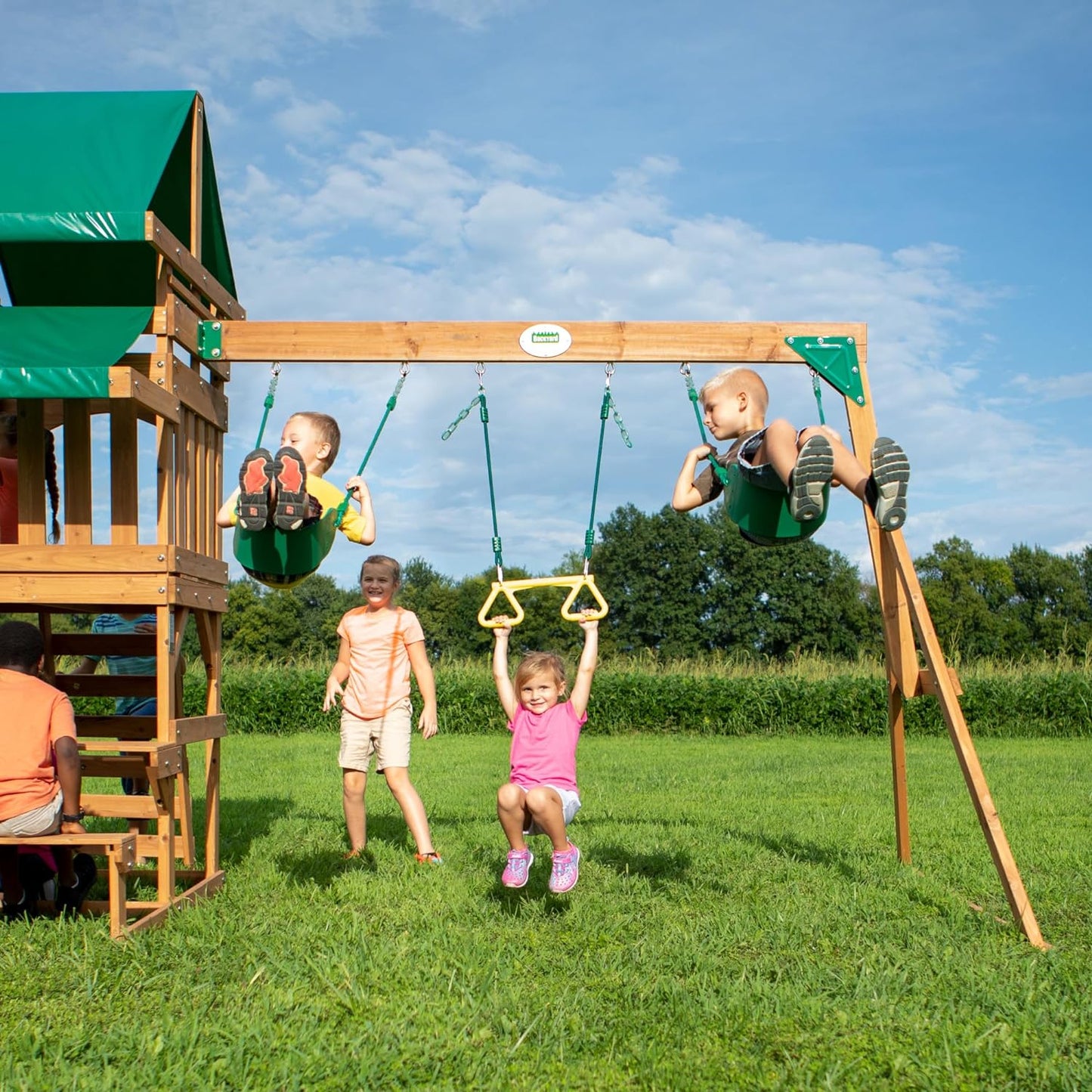 Backyard Discovery Belmont Cedar Wood Swing Set with Wave Slide, Play Deck, Rock Wall Ladder, Snack Bar Window, Shaded Picnic Area, Bench, Belt Swings, Trapeze, Sandbox Area, Canopy, Outdoor Playset